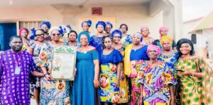 WhatsApp-Image-2026-03-30-at-11.32.14-300x149 VIE ASSOCIATIVE À PARAKOU : Distinction honorifique pour GANVO Clotilde, figure engagée de la promotion féminine à Damagourou