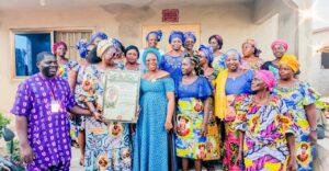 WhatsApp-Image-2026-03-30-at-11.32.15-300x156 VIE ASSOCIATIVE À PARAKOU : Distinction honorifique pour GANVO Clotilde, figure engagée de la promotion féminine à Damagourou